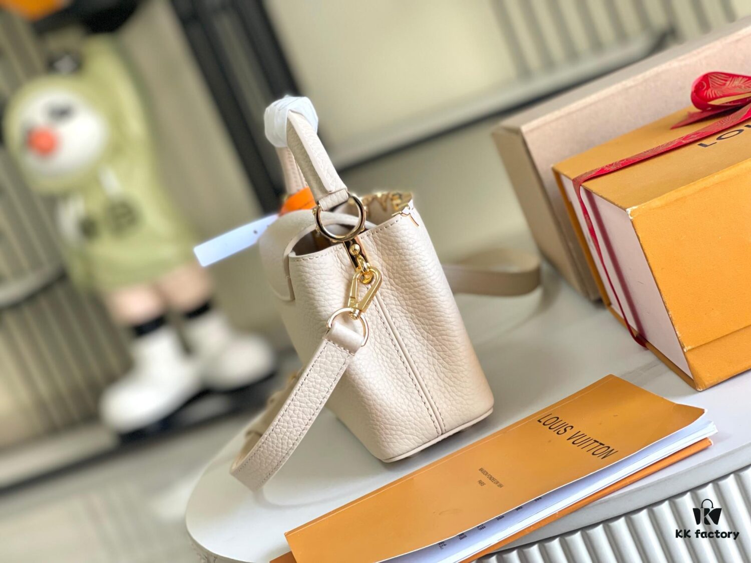 Capucines Mini Handbag with Detachable Strap, Full-Grain Taurillon Leather with Monogram Flowers and Mother-of-Pearl Details