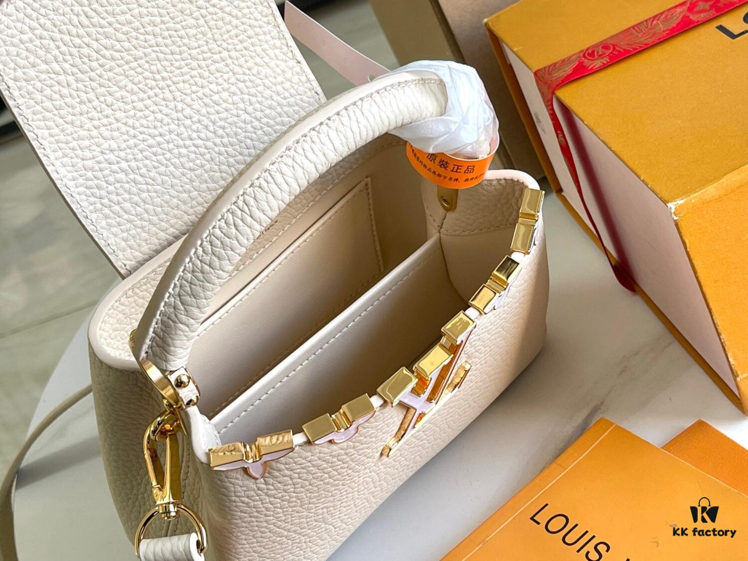 Capucines Mini Handbag with Detachable Strap, Full-Grain Taurillon Leather with Monogram Flowers and Mother-of-Pearl Details