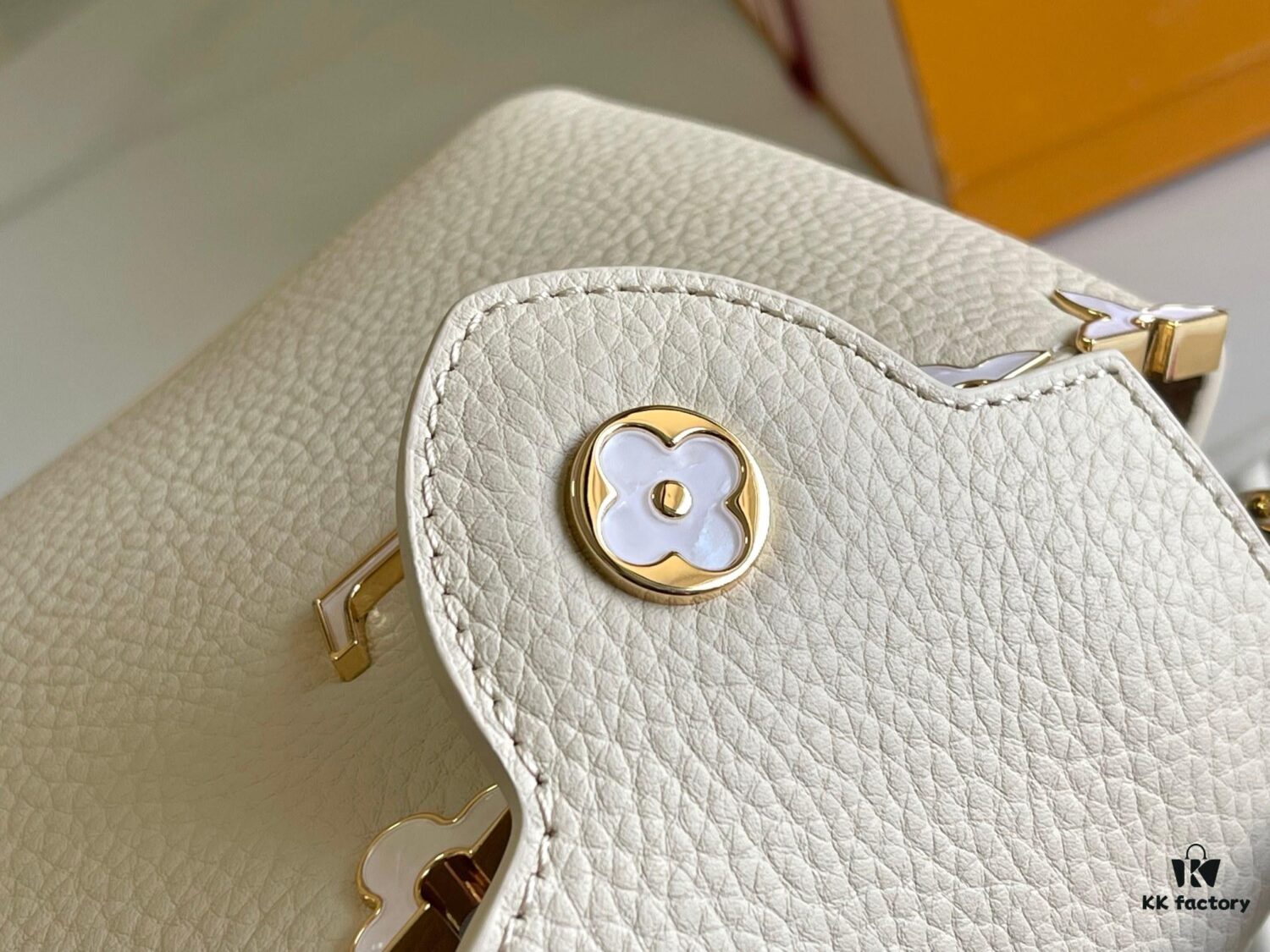 Capucines Mini Handbag with Detachable Strap, Full-Grain Taurillon Leather with Monogram Flowers and Mother-of-Pearl Details