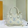 Upgraded Original M46833 White M45653 White Embossed M46569 This OnTheGo PM Bag Features Monogram Empreinte Leather with Subtle Tones Highlighting the LV Initials and Monogram Flowers Embossing Giving a Compact Square Silhouette a Delicate Sheen