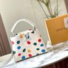 Upgraded M21663 This LV x YK Capucines Small Handbag is from the Louis Vuitton x Yayoi Kusama collaboration collection. The renowned Japanese artist, captivated by polka dots since childhood and viewing them as a symbol of infinity, vividly expresses this motif through 3D hand-painted polka dot prints on supple Taurillon leather.