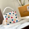 Upgraded M21663 This LV x YK Capucines Small Handbag is from the Louis Vuitton x Yayoi Kusama collaboration collection. The renowned Japanese artist, captivated by polka dots since childhood and viewing them as a symbol of infinity, vividly expresses this motif through 3D hand-painted polka dot prints on supple Taurillon leather.