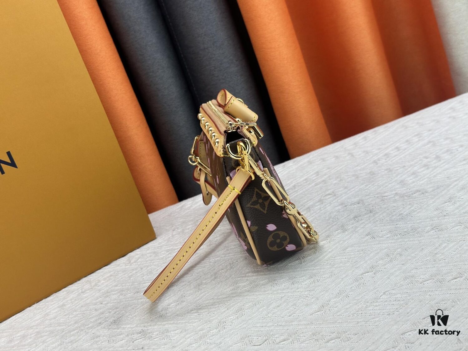 M13666 Pochette Accessoires Bag – A playful interpretation of the iconic Monogram canvas with Takashi Murakami's vibrant Cherry Blossom motif, revisiting the Louis Vuitton x Murakami collaboration with bold, whimsical style.