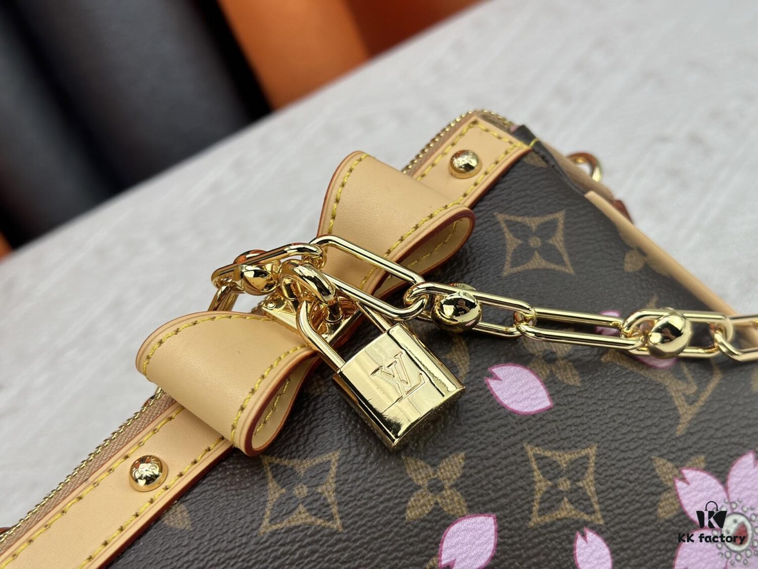M13666 Pochette Accessoires Bag – A playful interpretation of the iconic Monogram canvas with Takashi Murakami's vibrant Cherry Blossom motif, revisiting the Louis Vuitton x Murakami collaboration with bold, whimsical style.