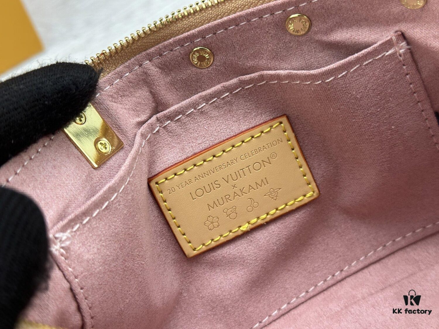 M13666 Pochette Accessoires Bag – A playful interpretation of the iconic Monogram canvas with Takashi Murakami's vibrant Cherry Blossom motif, revisiting the Louis Vuitton x Murakami collaboration with bold, whimsical style.