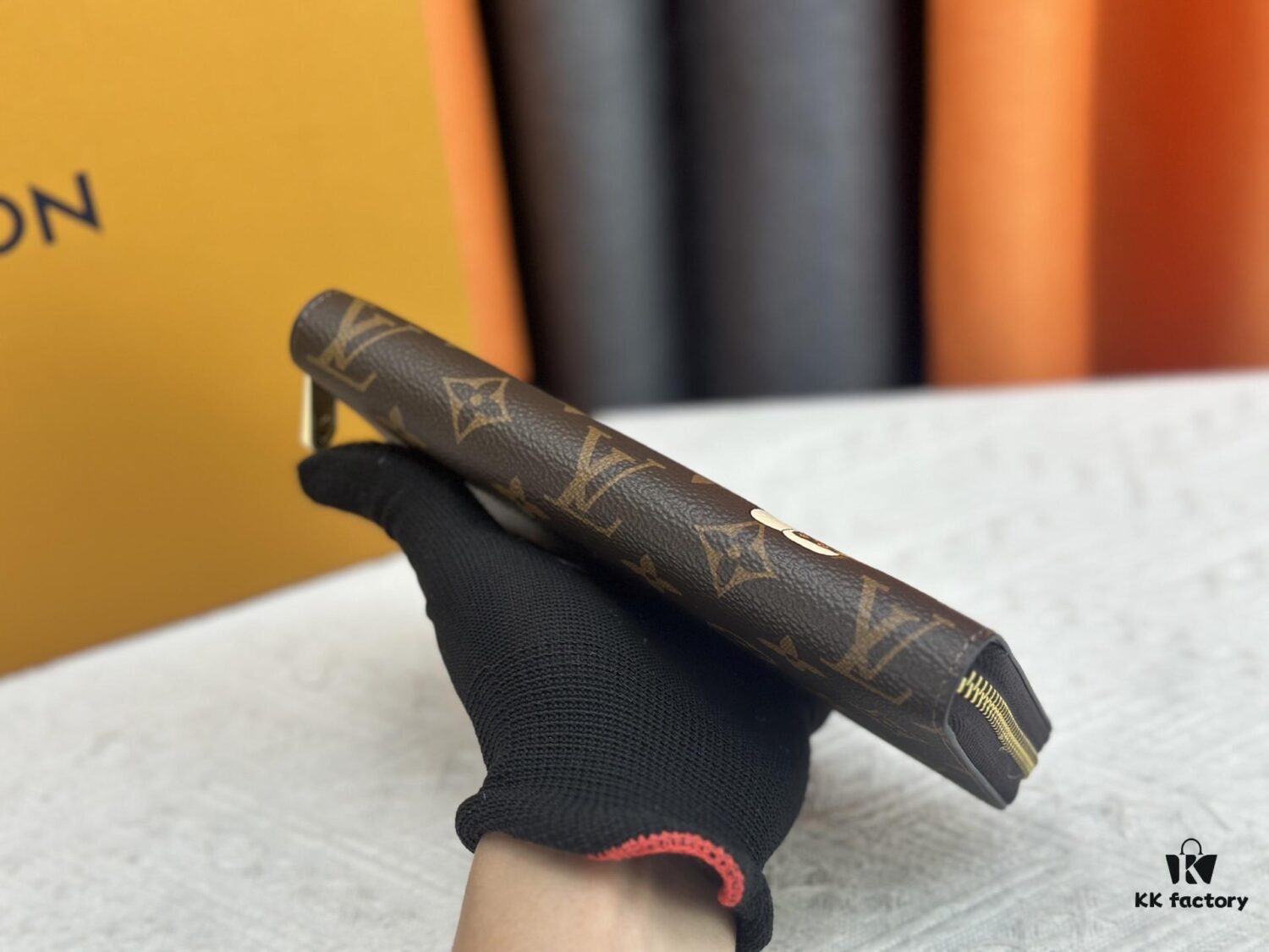 Wallet M60017 Umbrella M80857 M81544 This collectible multicolored zip-around wallet is crafted from Monogram canvas from the Vivienne Holidays 2022 collection, featuring an exquisite print of Louis Vuitton's mascot Vivienne standing in front of the brand's avant-garde Tokyo boutique with Japan's iconic Mount Fuji in the background. This vibrant high-end wallet serves as an invitation to journey and makes a perfect gift.