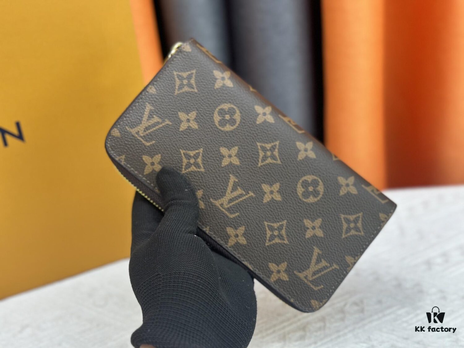 Wallet M60017 Umbrella M80857 M81544 This collectible multicolored zip-around wallet is crafted from Monogram canvas from the Vivienne Holidays 2022 collection, featuring an exquisite print of Louis Vuitton's mascot Vivienne standing in front of the brand's avant-garde Tokyo boutique with Japan's iconic Mount Fuji in the background. This vibrant high-end wallet serves as an invitation to journey and makes a perfect gift.