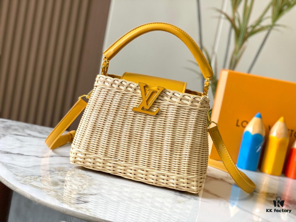 Upgraded M11617 Capucines BB Handbag featuring a woven rattan design inspired by the 1892 Louis Vuitton picnic trunk, crafted with cowhide leather handles and flap, metallic LV logo, detachable and adjustable leather shoulder strap for crossbody wear. Packaging may vary based on availability.