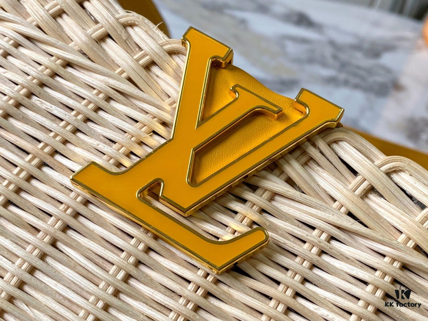 Upgraded M11617 Capucines BB Handbag featuring a woven rattan design inspired by the 1892 Louis Vuitton picnic trunk, crafted with cowhide leather handles and flap, metallic LV logo, detachable and adjustable leather shoulder strap for crossbody wear. Packaging may vary based on availability.