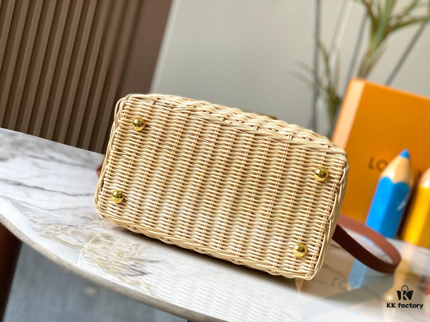 Upgraded M11617 Capucines BB Handbag featuring a woven rattan design inspired by the 1892 Louis Vuitton picnic trunk