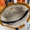 M24457 This Shopper Medium Bag Draws Inspiration from Louis Vuitton's Shopping Tote