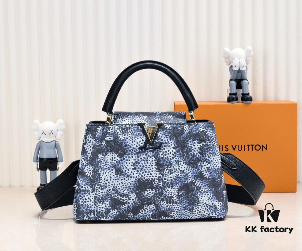 Upgraded Black M21726 Louis Vuitton x Yayoi Kusama Capsule Collection Reimagines the LV x YK Capucines Medium Handbag in a Surreal Dreamscape, Drawing Inspiration from the Japanese Artist's 'My Eternal Soul' Series Since 2009, Featuring Eccentric Faces and Organic Forms. The Artistic Design Is Enhanced with Printed and Embroidered Motifs on Luxurious Taurillon Leather, Making It a Distinguished Addition to Any Art-Inspired Collection.