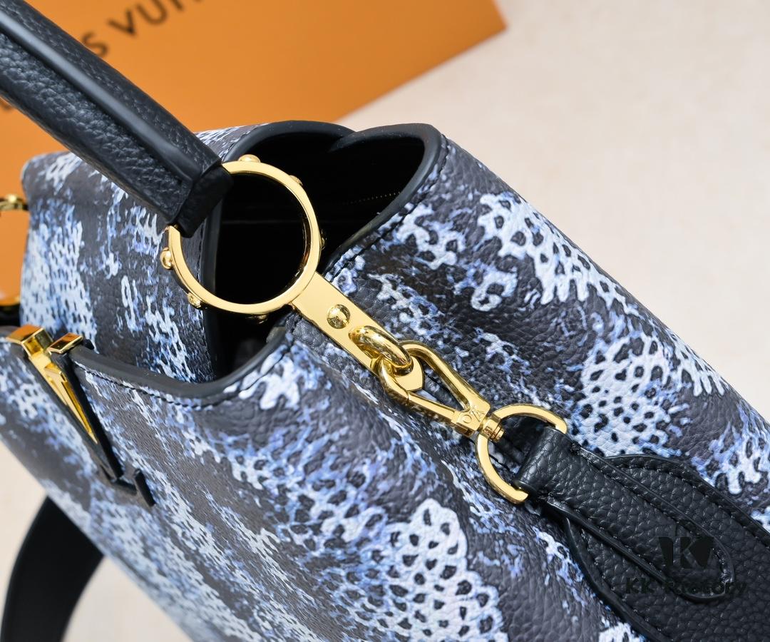 Upgraded Black M21726 Louis Vuitton x Yayoi Kusama Capsule Collection Reimagines the LV x YK Capucines Medium Handbag in a Surreal Dreamscape, Drawing Inspiration from the Japanese Artist's 'My Eternal Soul' Series Since 2009, Featuring Eccentric Faces and Organic Forms. The Artistic Design Is Enhanced with Printed and Embroidered Motifs on Luxurious Taurillon Leather, Making It a Distinguished Addition to Any Art-Inspired Collection.