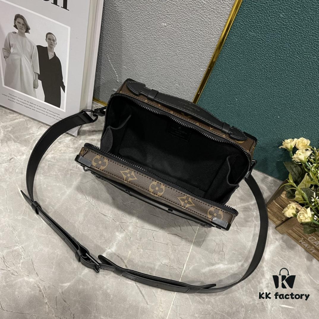 Upgraded Version 🔥 M45935 59163 Handle Soft Trunk Handbag crafted from Louis Vuitton's iconic Monogram Macassar canvas, featuring stud corners and leather reinforcement straps that evoke the brand's trunk-making heritage. Sleek silhouette with a detachable shoulder strap allows easy portability for small electronic devices and personal essentials. Wide opening facilitates convenient access to contents.