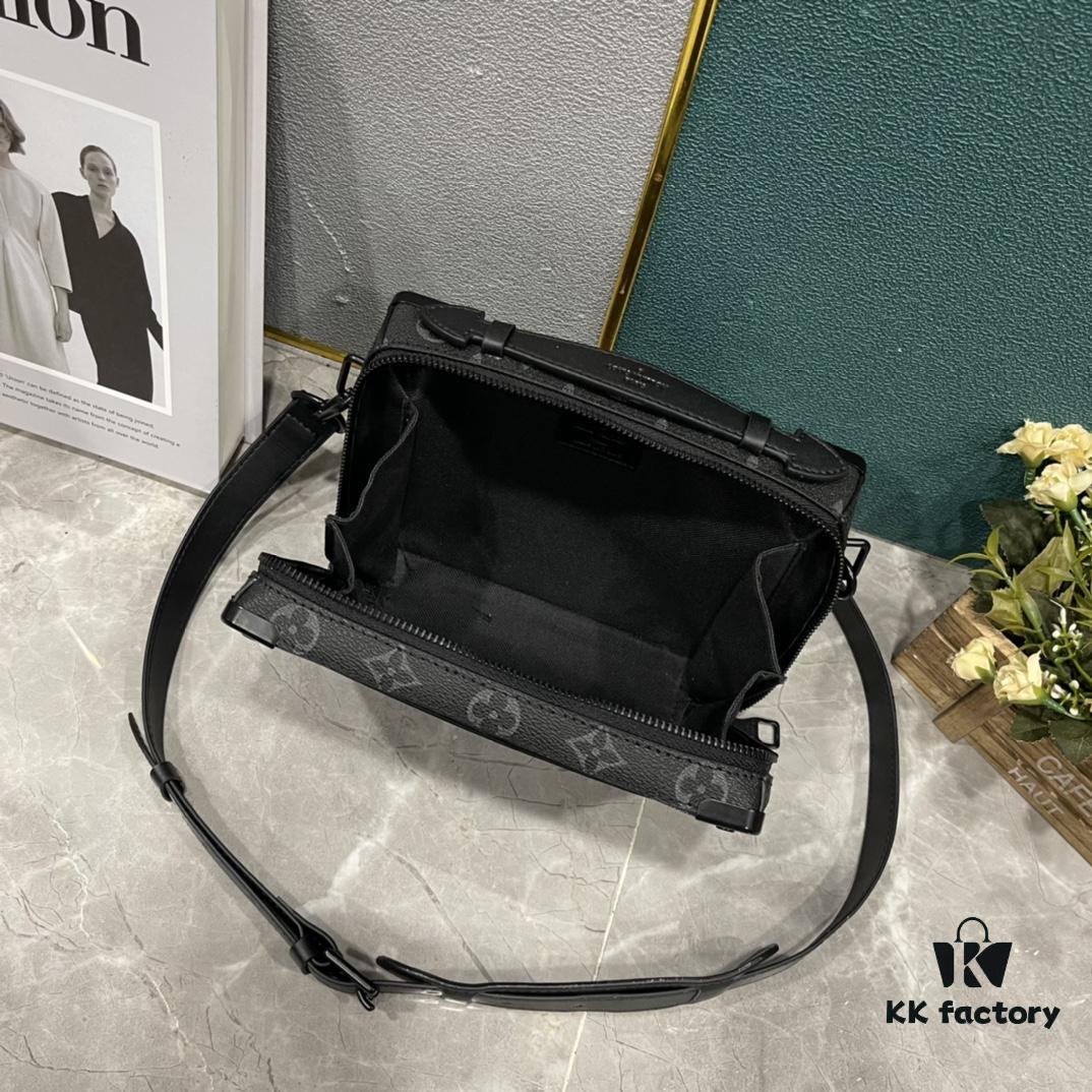 Upgraded Version 🔥 M45935 59163 Handle Soft Trunk Handbag crafted from Louis Vuitton's iconic Monogram Macassar canvas, featuring stud details at corners and leather-reinforced straps that evoke the brand's trunk-making heritage. Its clean silhouette and detachable shoulder strap offer effortless carry for small electronics and daily essentials. The wide-opening design ensures easy access to contents.