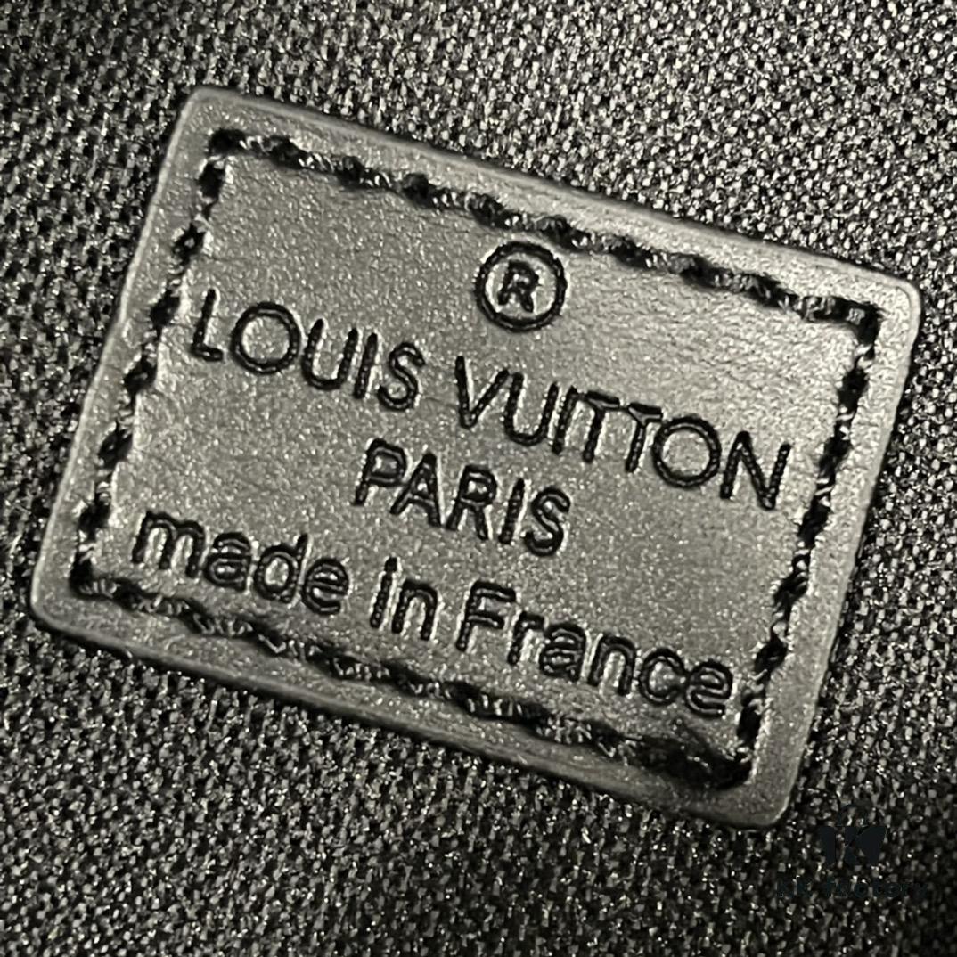 Upgraded Version! Latest Release! M81321 M81323 M81005 Black Gray Floral, Black Embossed, Gray Embossed FLAP DOUBLE Phone Bag — A Collaboration Between Japanese Designer and DJ Nigo and Virgil Abloh for the NIGO® x Louis Vuitton Capsule Collection. This Flap Double phone bag features a black-silver two-tone design with a flap-style messenger silhouette, ideal for carrying your phone and daily essentials.