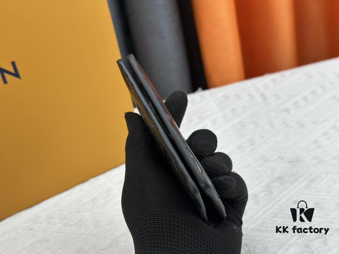 M62899 Wallet: This compact wallet reinterprets the classic design with Monogram Shadow leather. Soft cowhide is embossed with Louis Vuitton's iconic Monogram pattern, while interior compartments and card slots provide organized storage for everyday essentials.