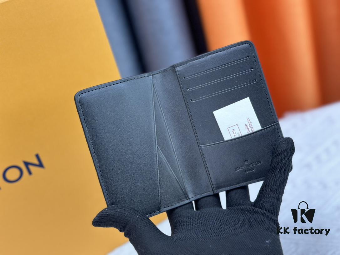 M62899 Wallet: This compact wallet reinterprets the classic design with Monogram Shadow leather. Soft cowhide is embossed with Louis Vuitton's iconic Monogram pattern, while interior compartments and card slots provide organized storage for everyday essentials.