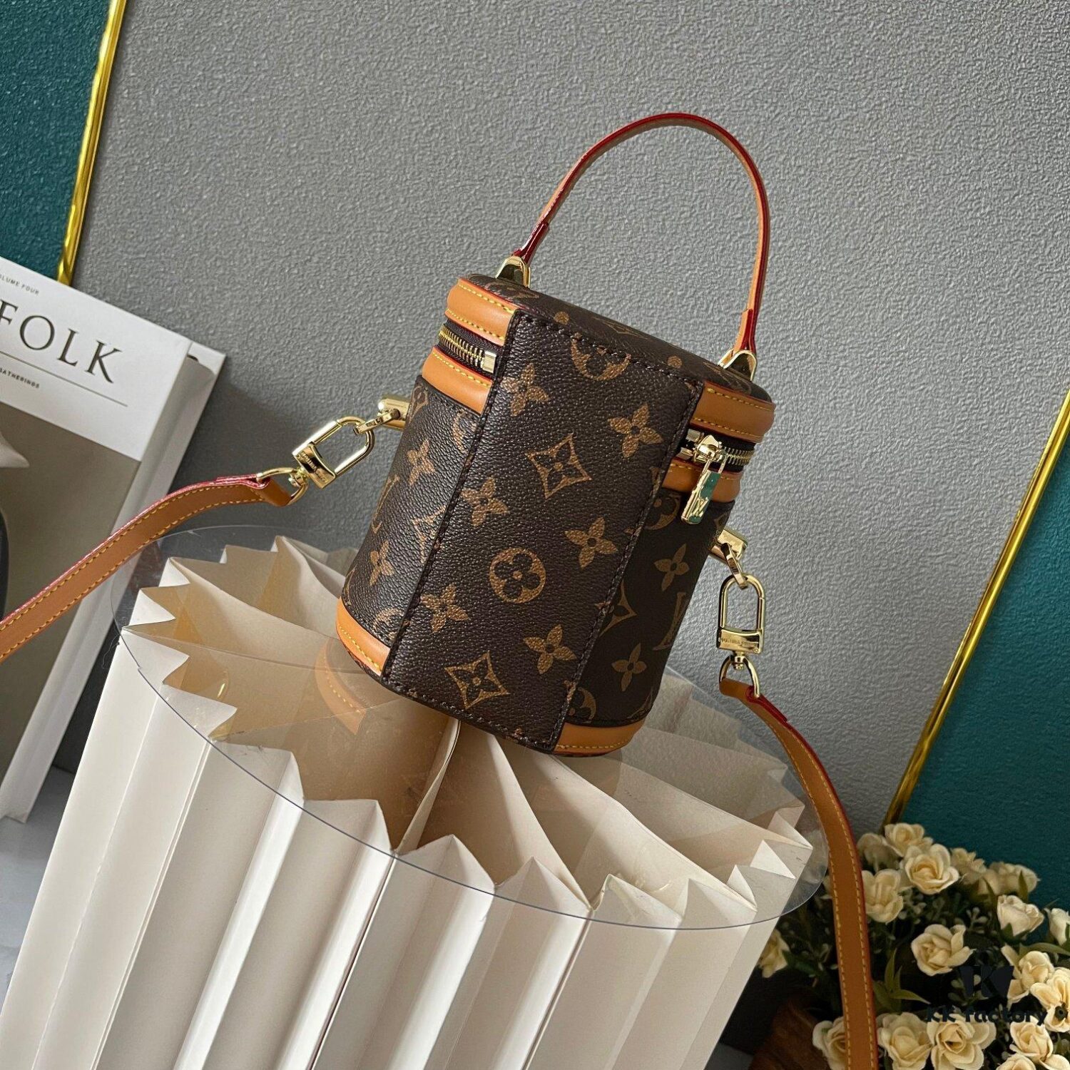 Upgraded Version [Exclusive Real Photo M82952 Damier Azur and Sunflower] This Nano Cannes Handbag features a cylindrical silhouette crafted from Monogram canvas, echoing the design of a makeup pouch.