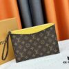 M60910, Real Item Photography, Exquisitely Crafted Pallas Clutch Combining Classic Monogram Canvas with Vibrant Colors for a Delightful Effect