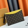 M60910, Real Item Photography, Exquisitely Crafted Pallas Clutch Combining Classic Monogram Canvas with Vibrant Colors for a Delightful Effect