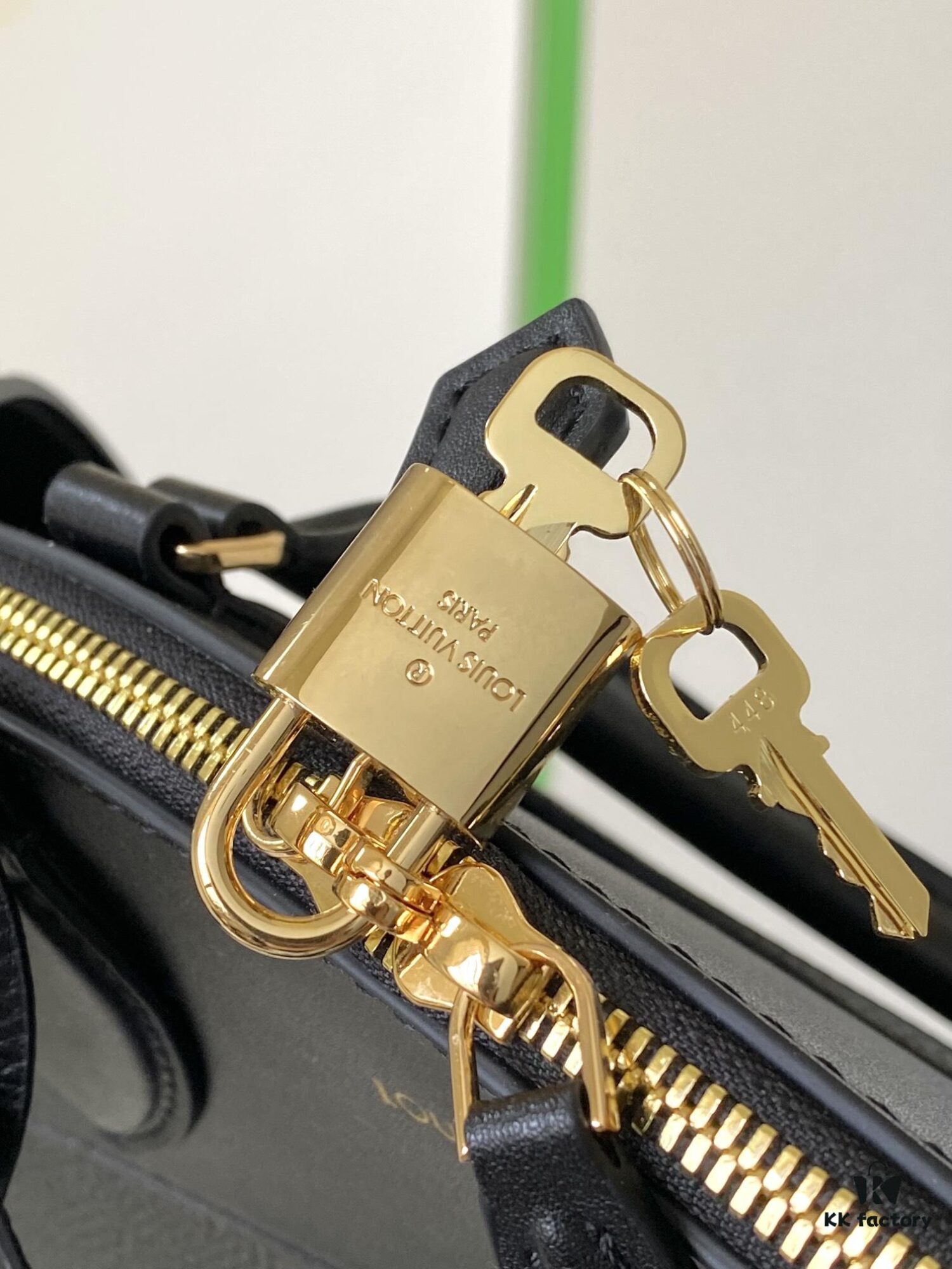 M22914 Black Lock It MM Bag in Refined Taurillon Leather with Gold-Tone Hardware