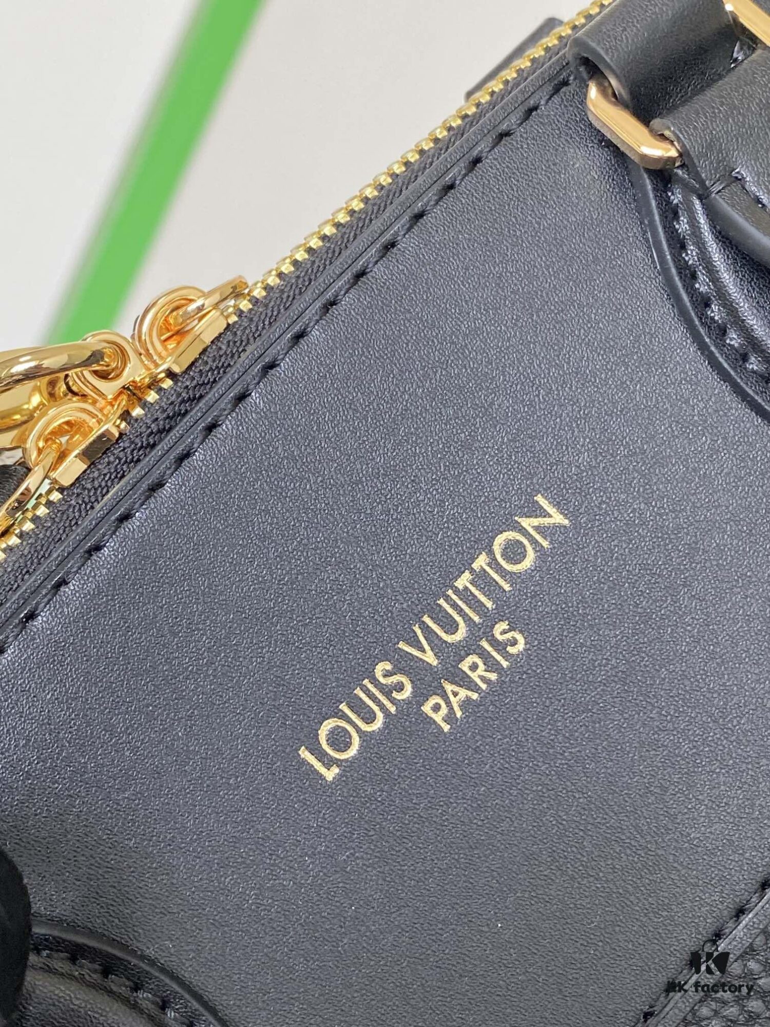 M22914 Black Lock It MM Bag in Refined Taurillon Leather with Gold-Tone Hardware