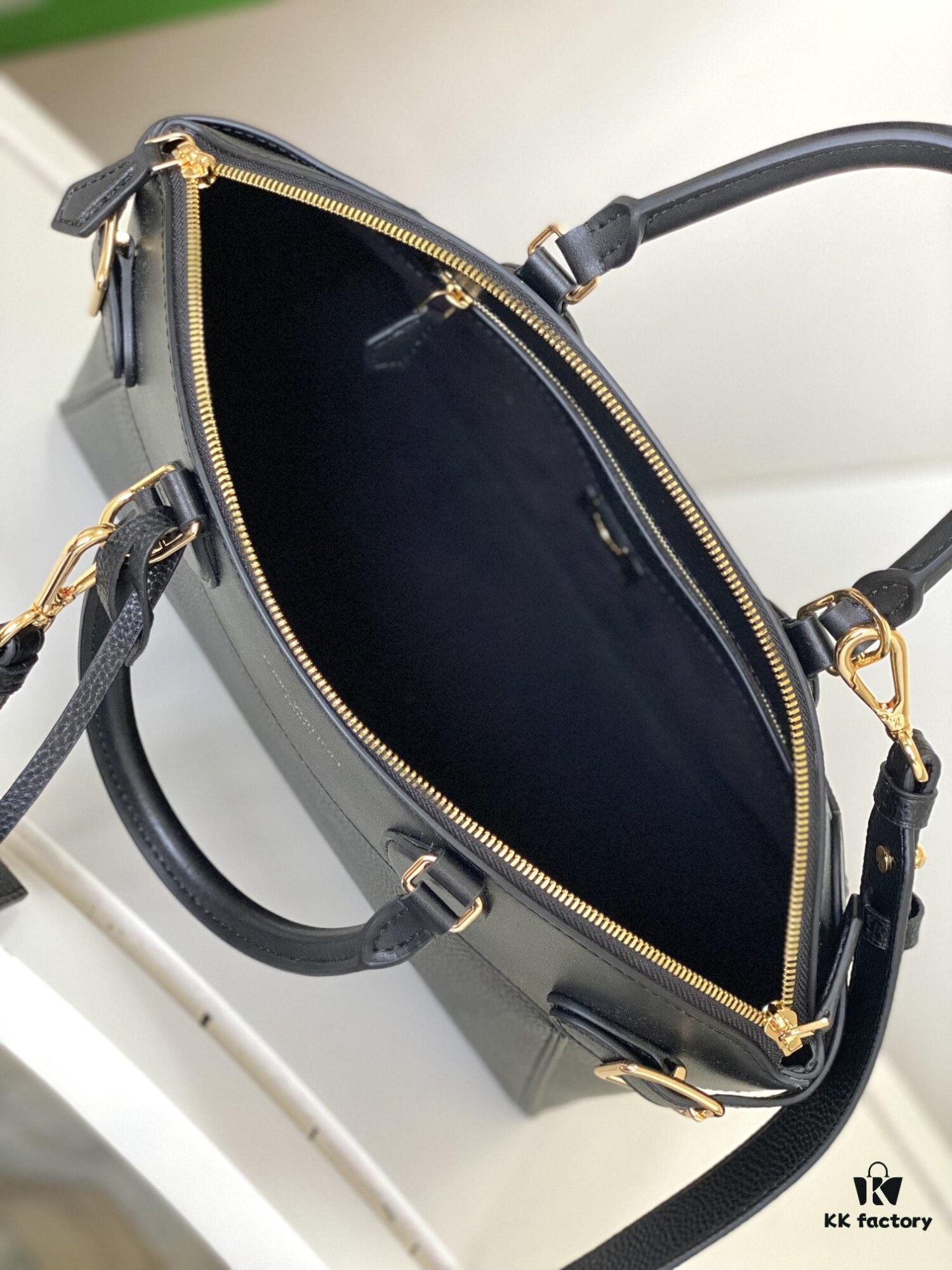 M22914 Black Lock It MM Bag in Refined Taurillon Leather with Gold-Tone Hardware
