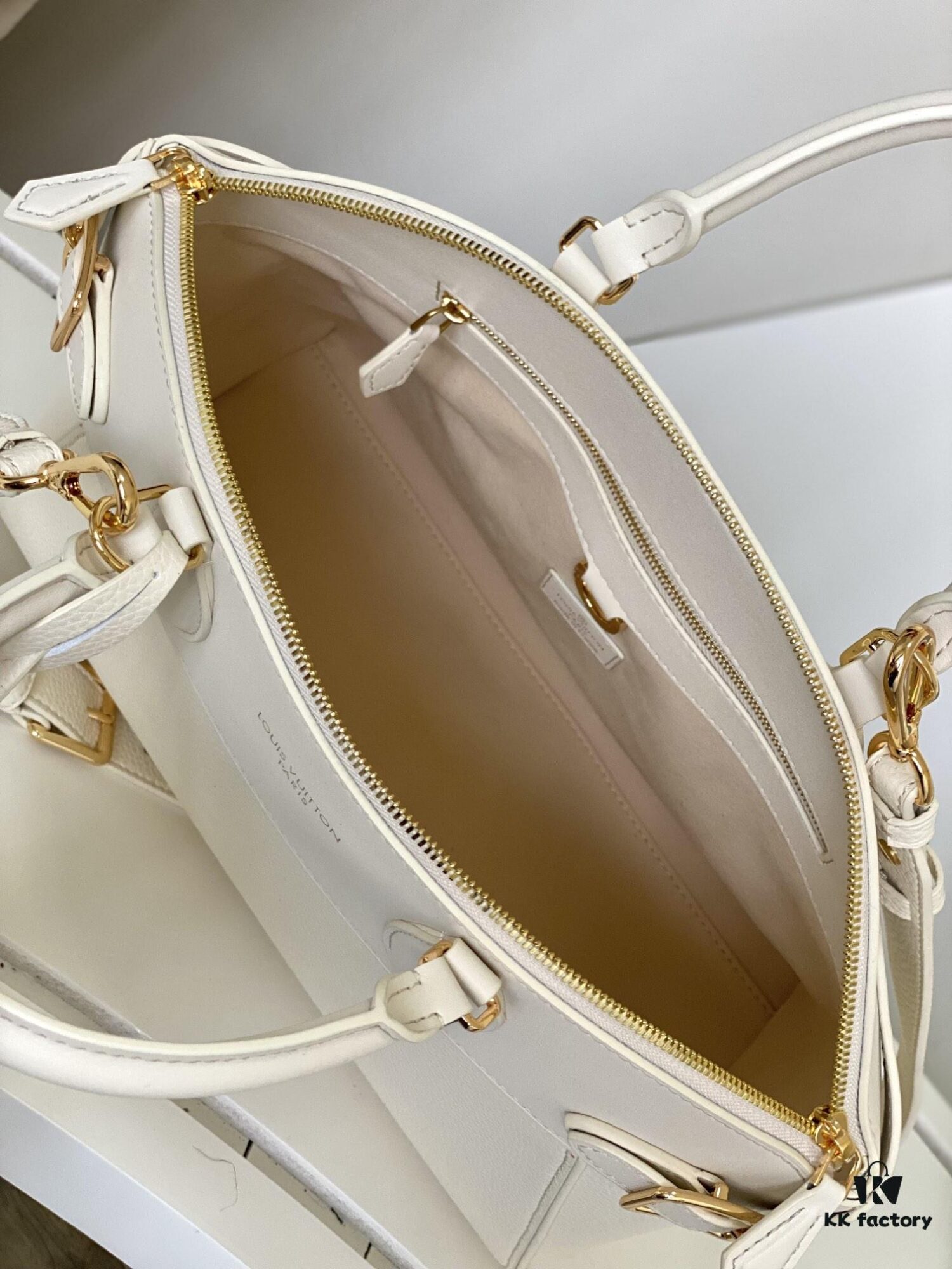 M23061 White Lock It MM Bag in Refined Taurillon Leather