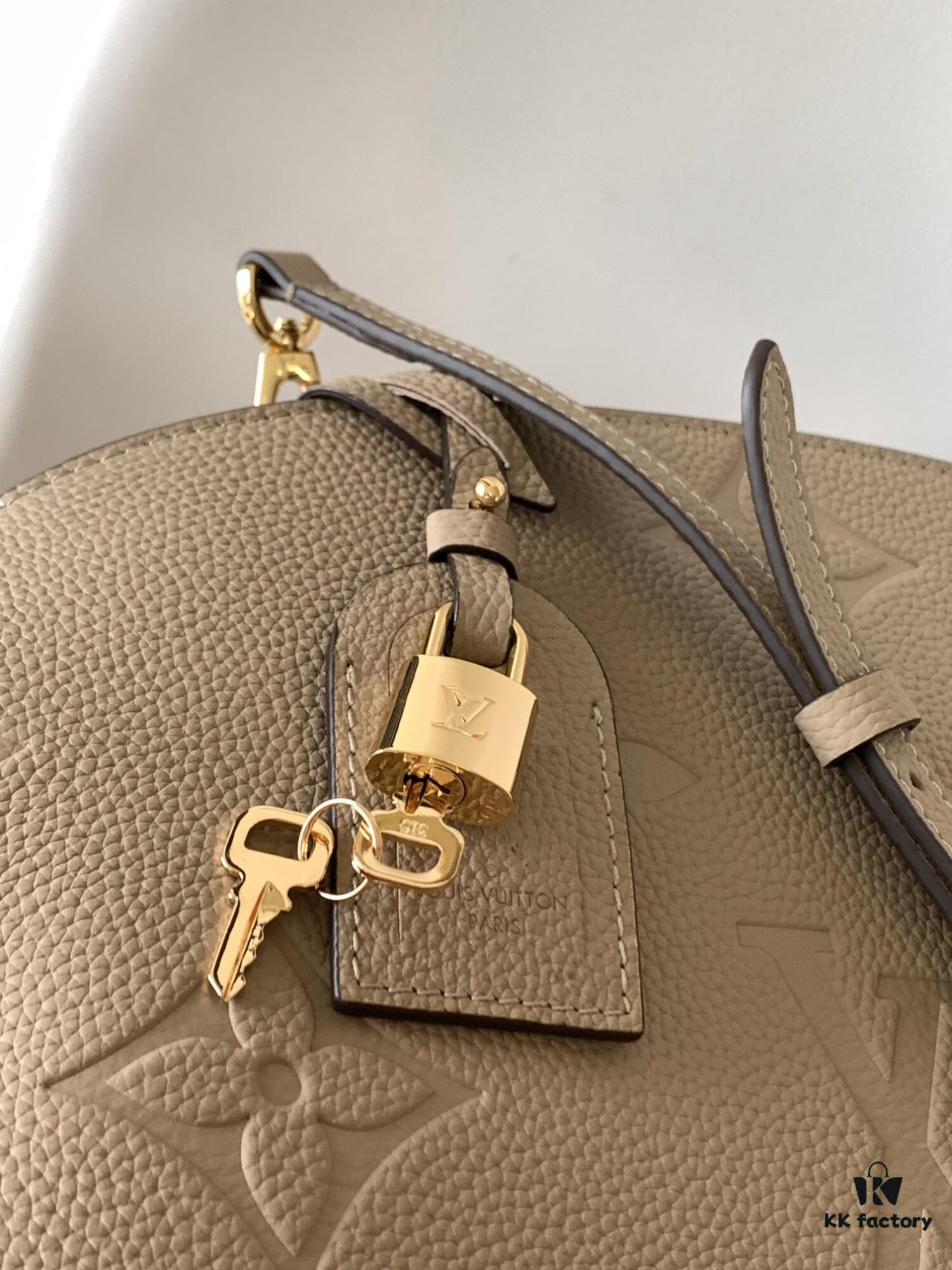 Petit Palais Handbag in Grained Leather with Monogram Flower Embossing