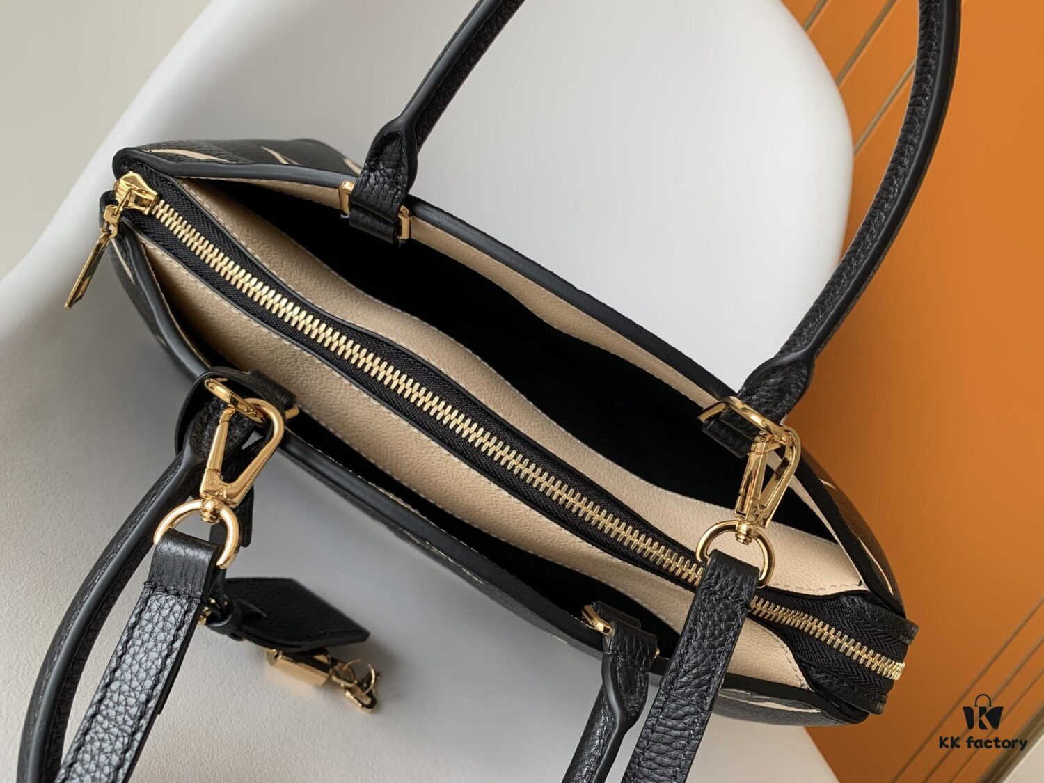 Petit Palais Handbag in Grained Leather with Oversized Monogram Flower and LV Initials