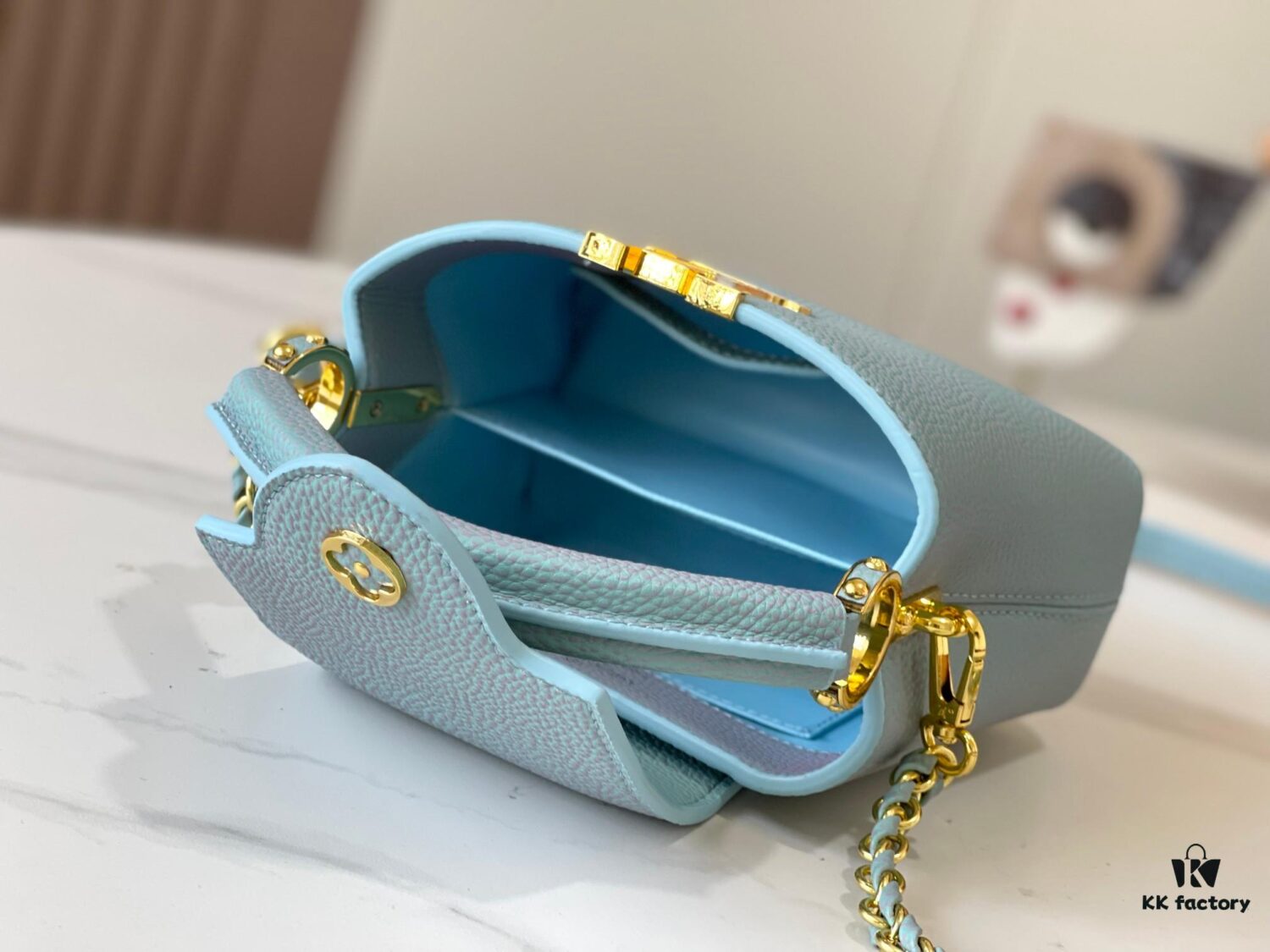 Upgraded M59850 Stellar Pearlized Blue Shell Button Capucines Mini Bag