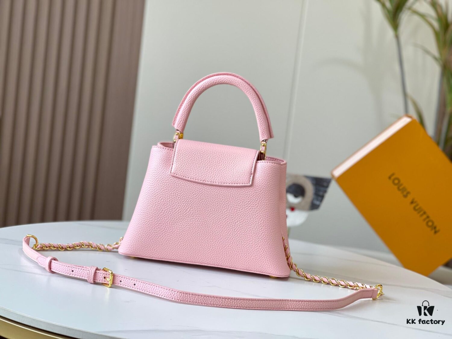 Upgraded M59868 Stellar Pearlized Powder with Mother-of-Pearl Button - This Capucines BB Bag Features Taurillon Leather That Shimmers in Changing Hues Under Different Lights