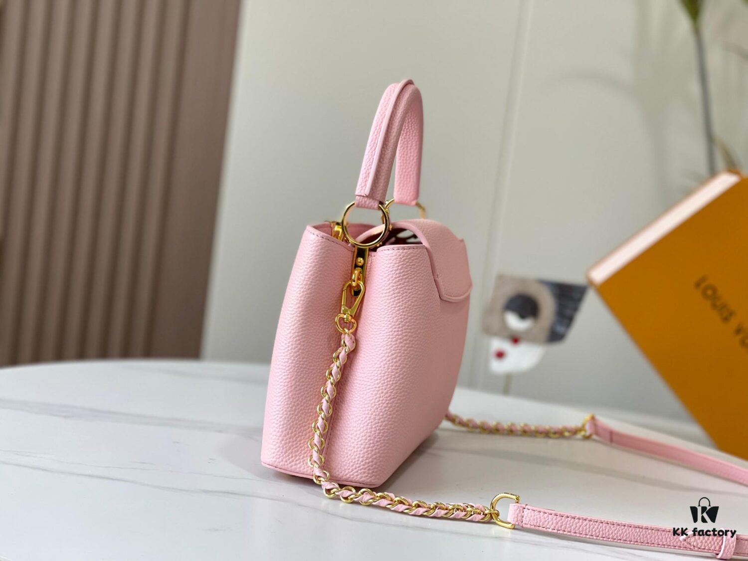 Upgraded M59868 Stellar Pearlized Powder with Mother-of-Pearl Button - This Capucines BB Bag Features Taurillon Leather That Shimmers in Changing Hues Under Different Lights