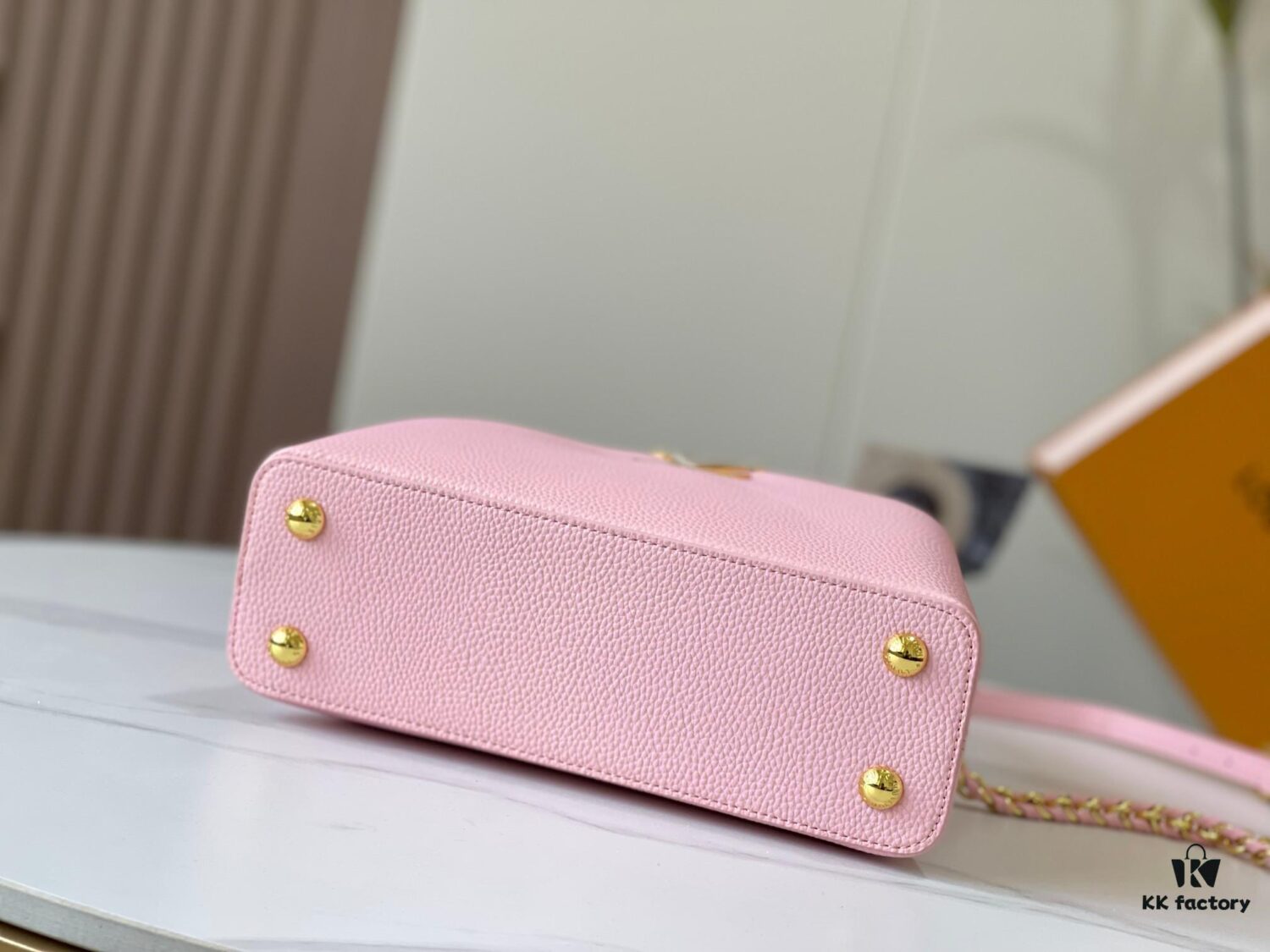 Upgraded M59868 Stellar Pearlized Powder with Mother-of-Pearl Button - This Capucines BB Bag Features Taurillon Leather That Shimmers in Changing Hues Under Different Lights