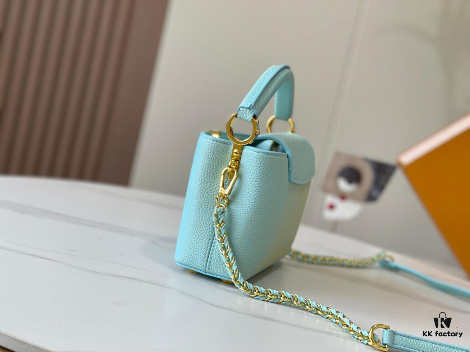 Upgraded M59850 Stellar Pearl Blue Shell Button Capucines Mini Bag