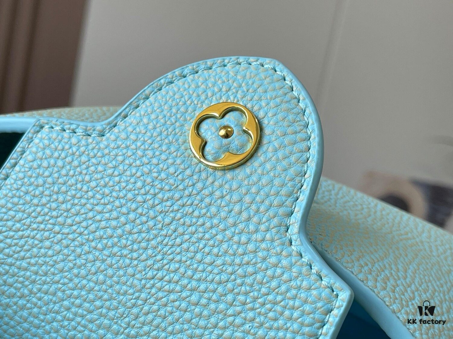 Upgraded M59850 Stellar Pearl Blue Shell Button Capucines Mini Bag