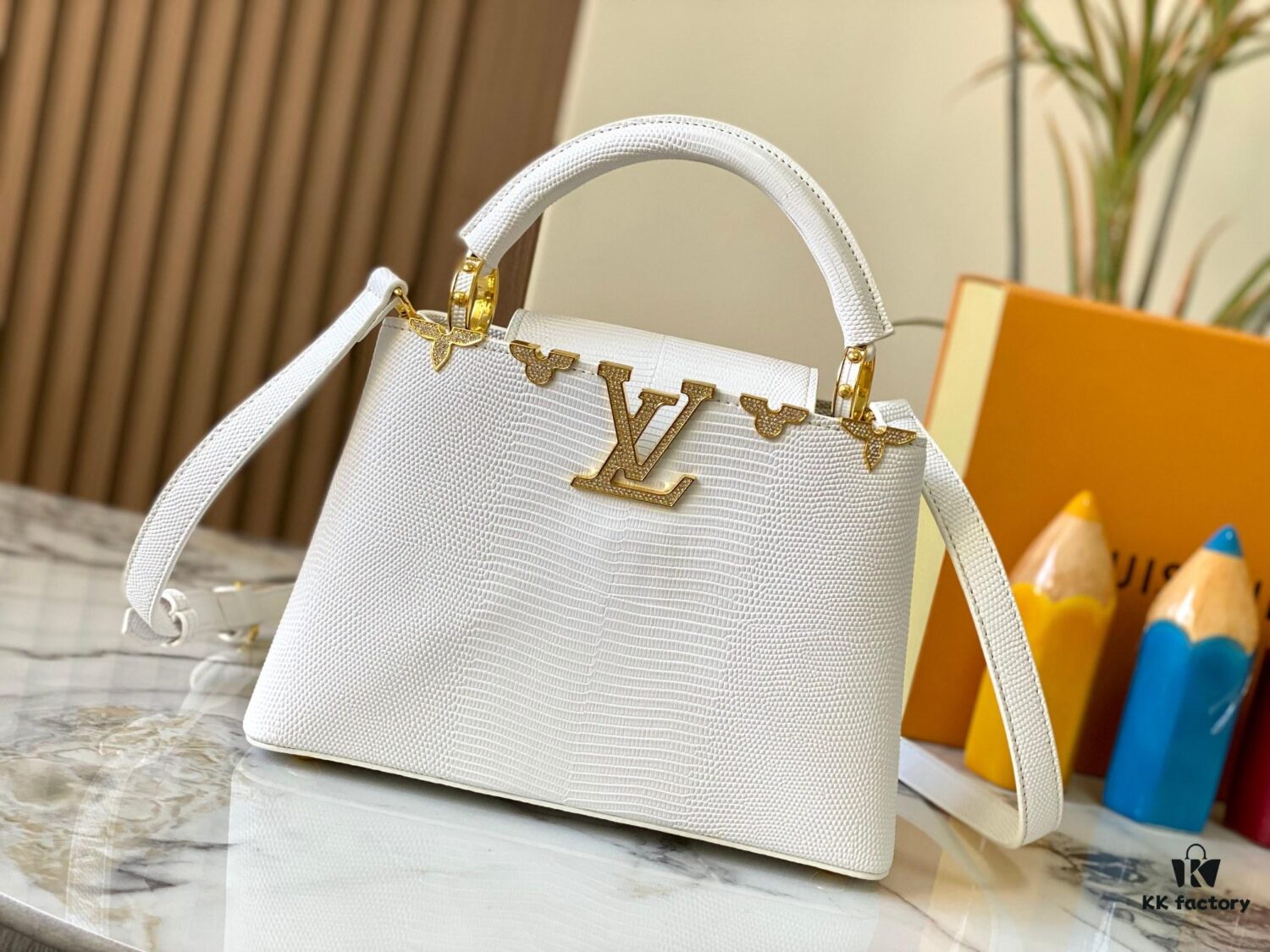 Top Quality Guangzhou Original M12297 White Lizard Skin with Gold Diamond Crown Triangle Capucines BB Bag