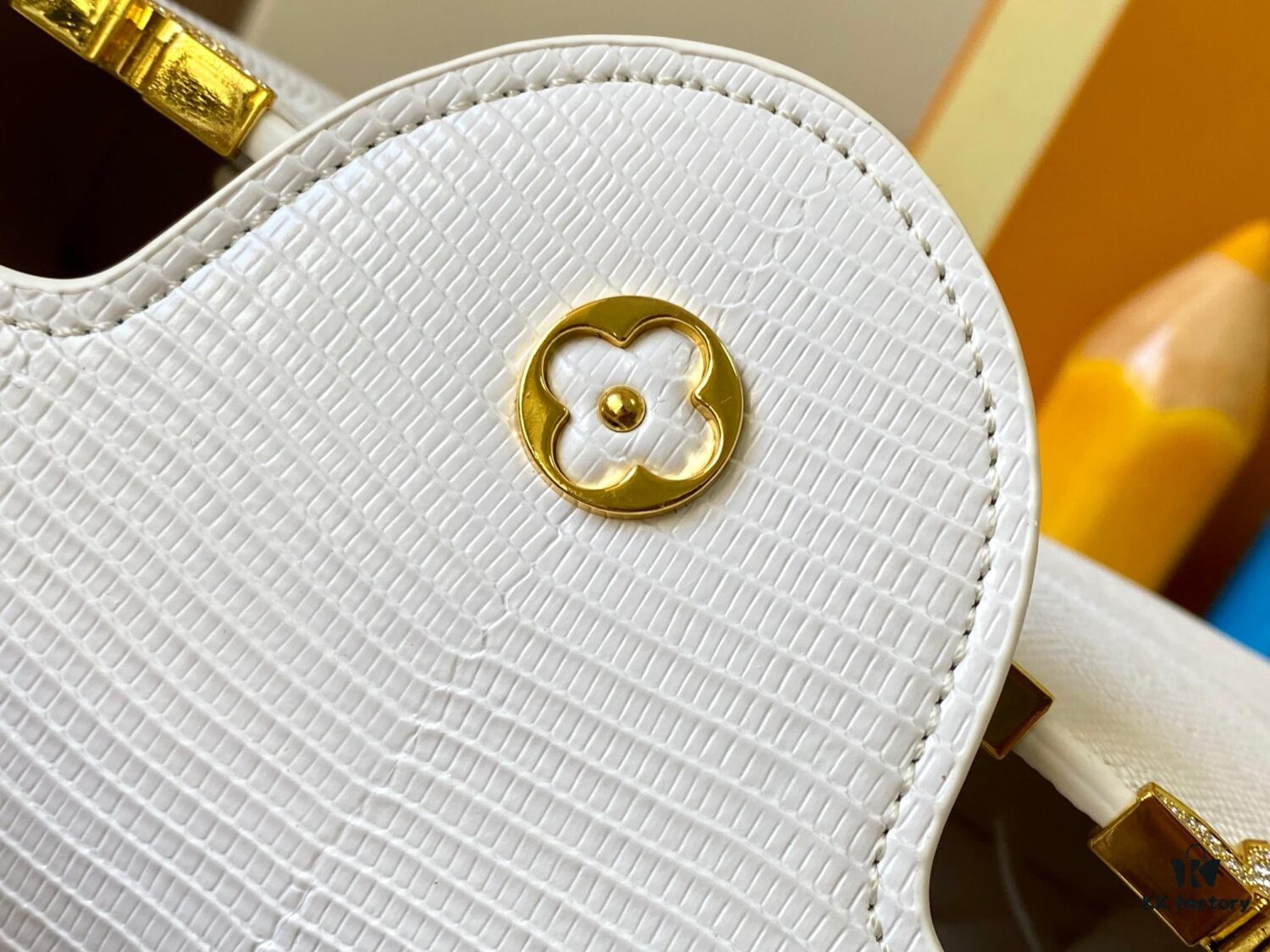 Top Quality Guangzhou Original M12297 White Lizard Skin with Gold Diamond Crown Triangle Capucines BB Bag