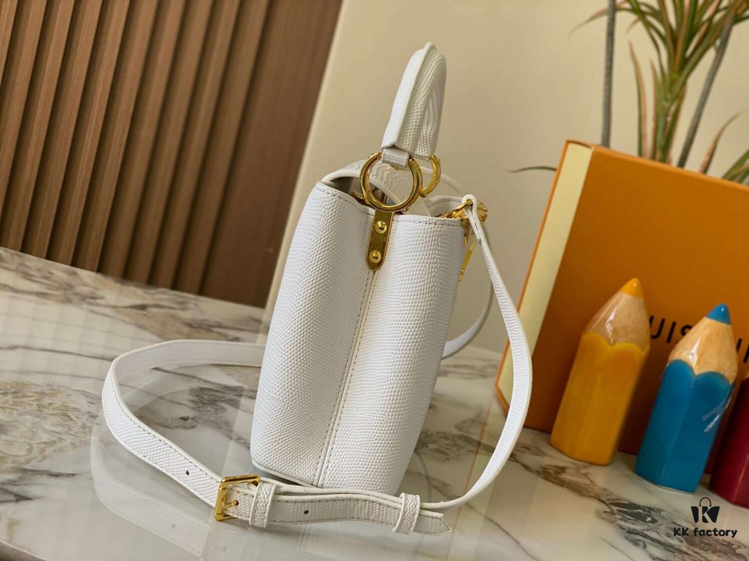 Top Quality Guangzhou Original M12297 White Lizard Skin with Gold Diamond Crown Triangle Capucines BB Bag