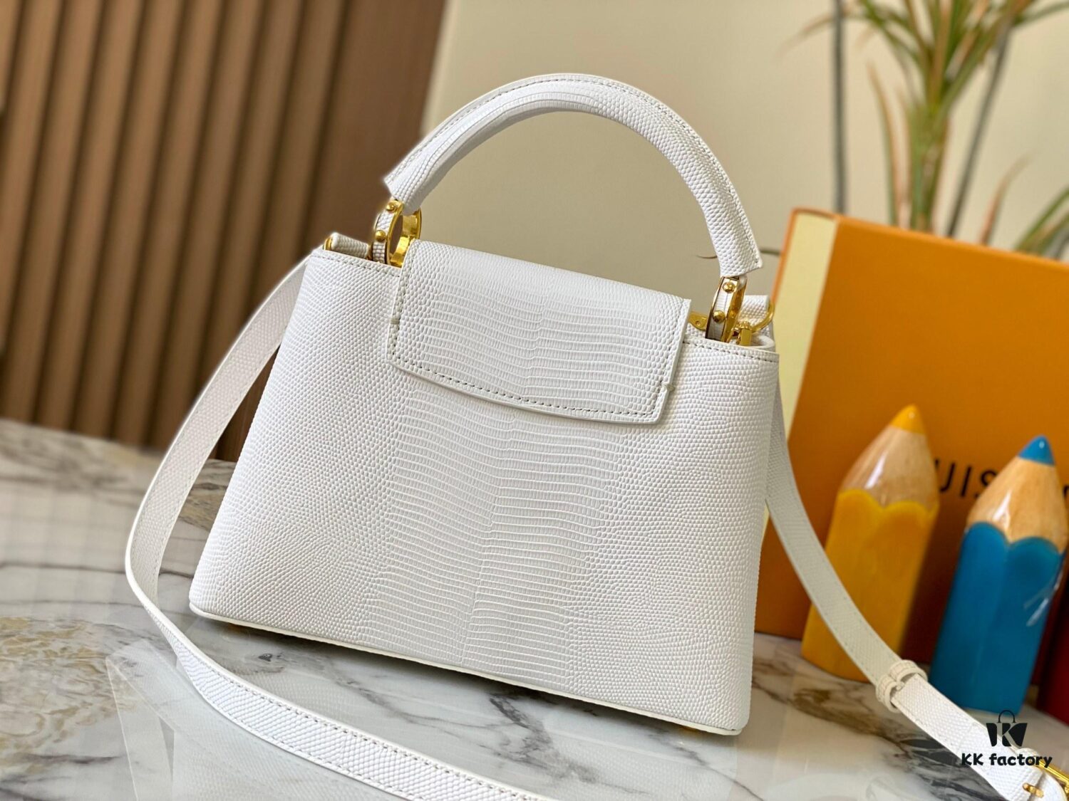 Top Quality Guangzhou Original M12297 White Lizard Skin with Gold Diamond Crown Triangle Capucines BB Bag