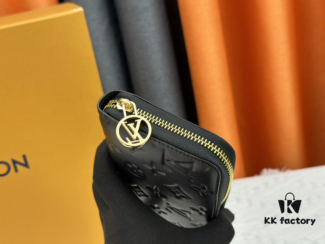 Wallet M81510 crafted in lambskin with padded Monogram embossed pattern, complementing the Coussin leather goods collection. The elegant design features a gold-tone zipper with an LV Circle pull tab. This multi-functional wallet includes practical interior features: three large compartments, a coin pocket, and twelve card slots.