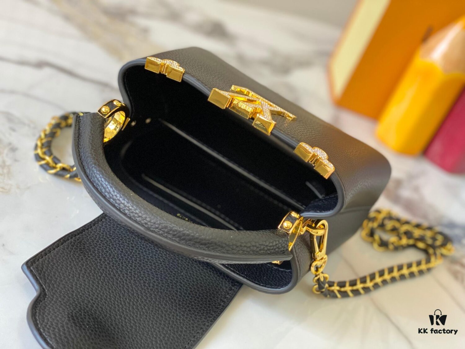 69307ef46e68136f4d9a74c2 Top Quality Original Guangzhou Version M24583 Black with Gold Diamond Flower Crown Capucines Flower Crown Handbag