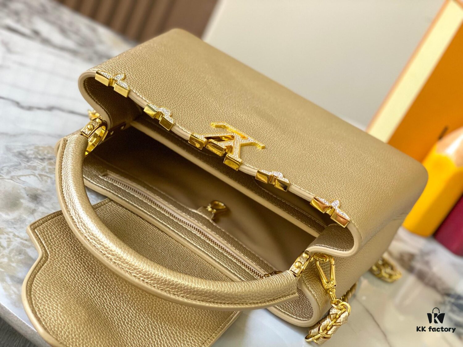 69307efc6e68136f4d9a74ce Top Quality Original Guangzhou Version M24585 Gold-Tone Flower Crown Capucines Bag with Crystal Diamonds