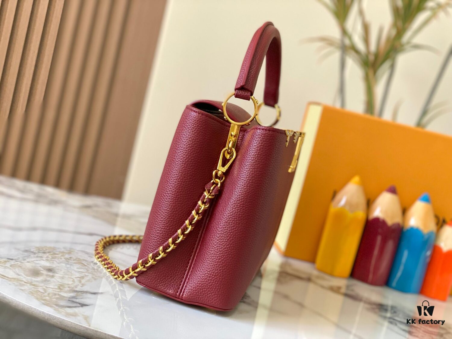 69307f096e68136f4d9a74e3 Top Quality Original Guangzhou Version M24585 Chestnut Red and Gold Diamond Flower Crown Capucines Handbag