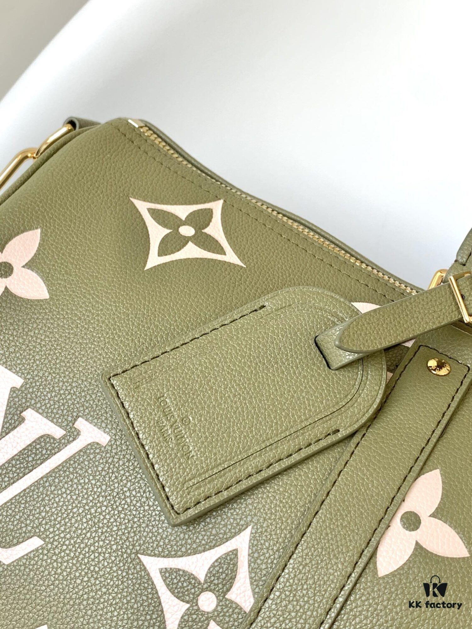 M46670 Black M46671 Green Keepall Bandoulière 45 in Monogram Empreinte Embossed Leather