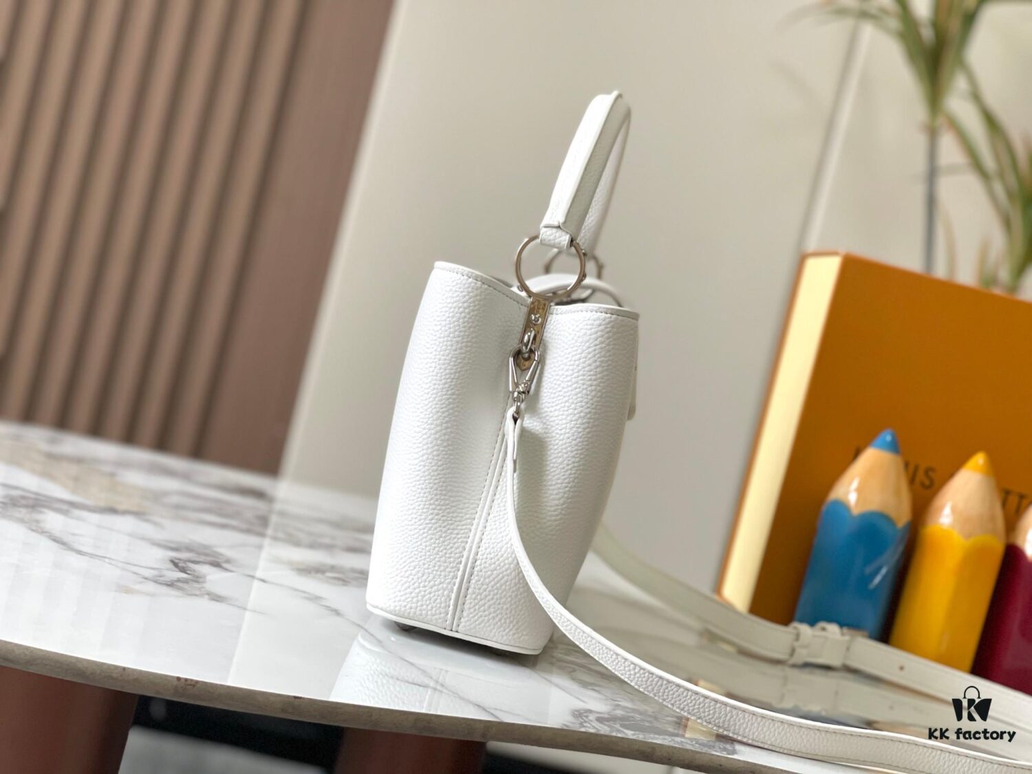 Upgraded M24664 Capucines East West Medium Handbag from the LV Crush Collection