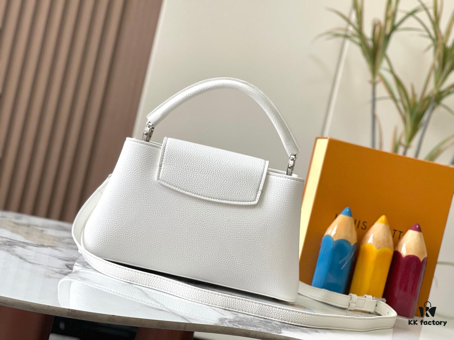 Upgraded M24664 Capucines East West Medium Handbag from the LV Crush Collection