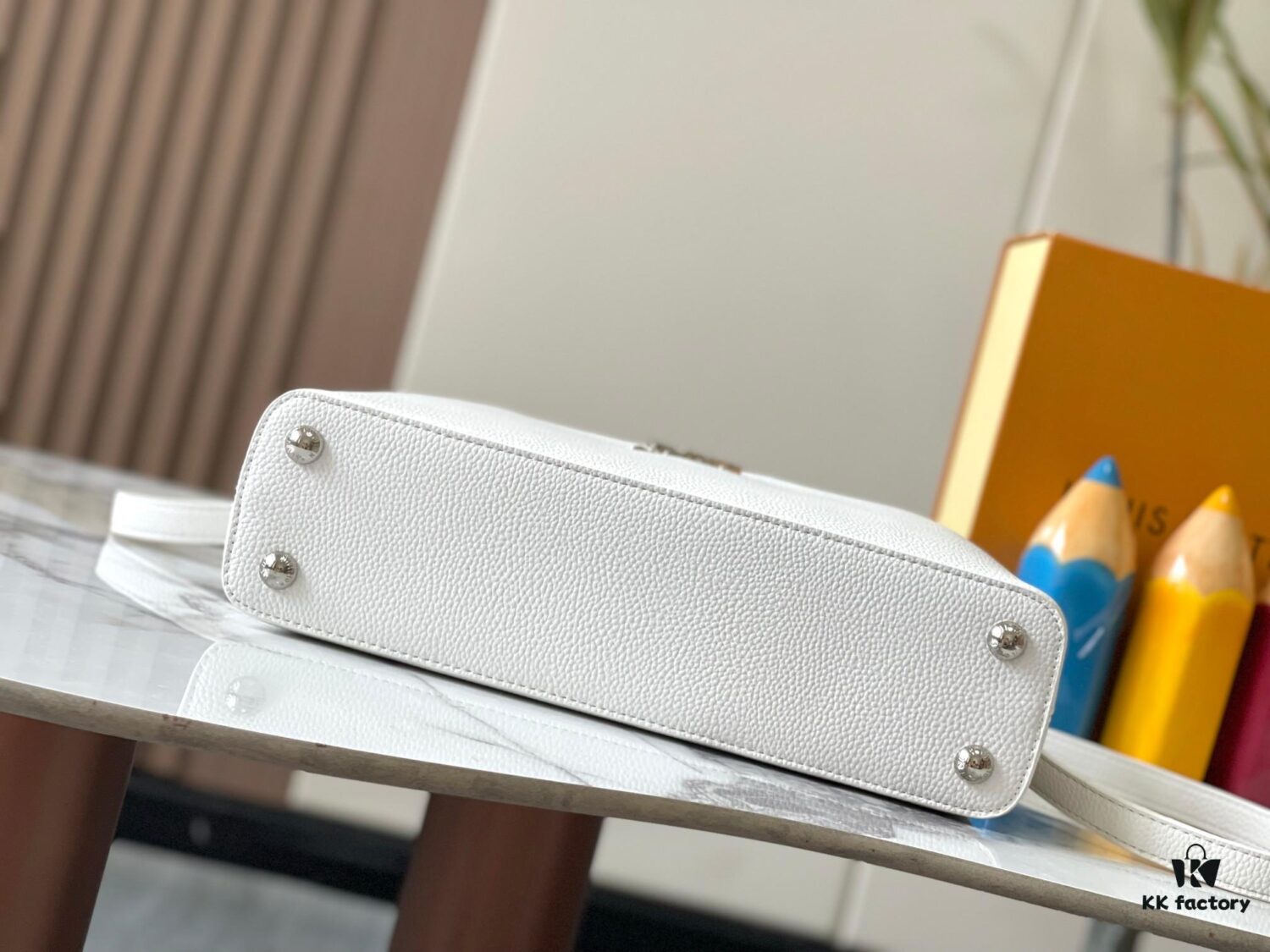 Upgraded M24664 Capucines East West Medium Handbag from the LV Crush Collection