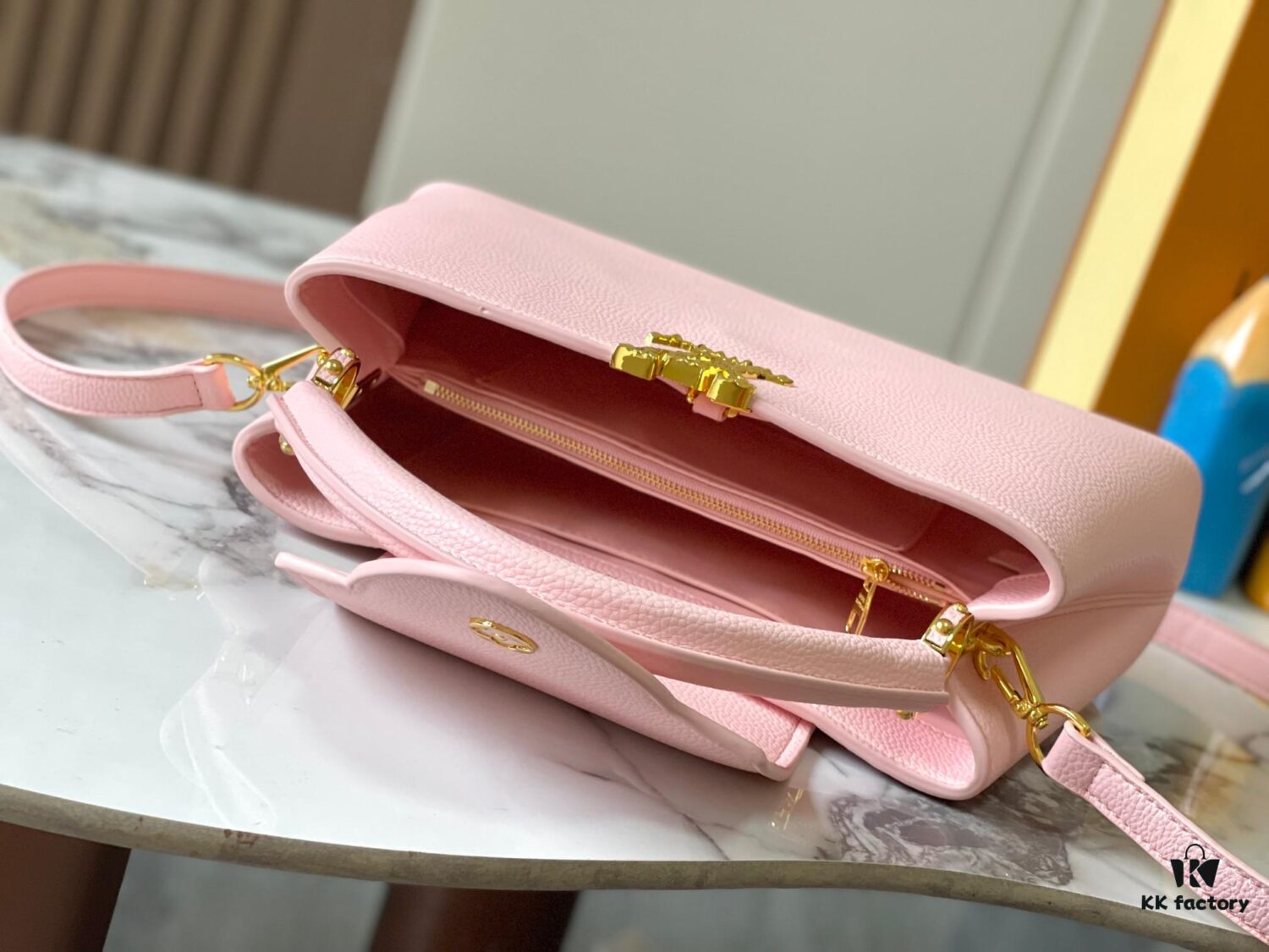 Upgraded M24664 Capucines East West Medium Handbag from the LV Crush Collection